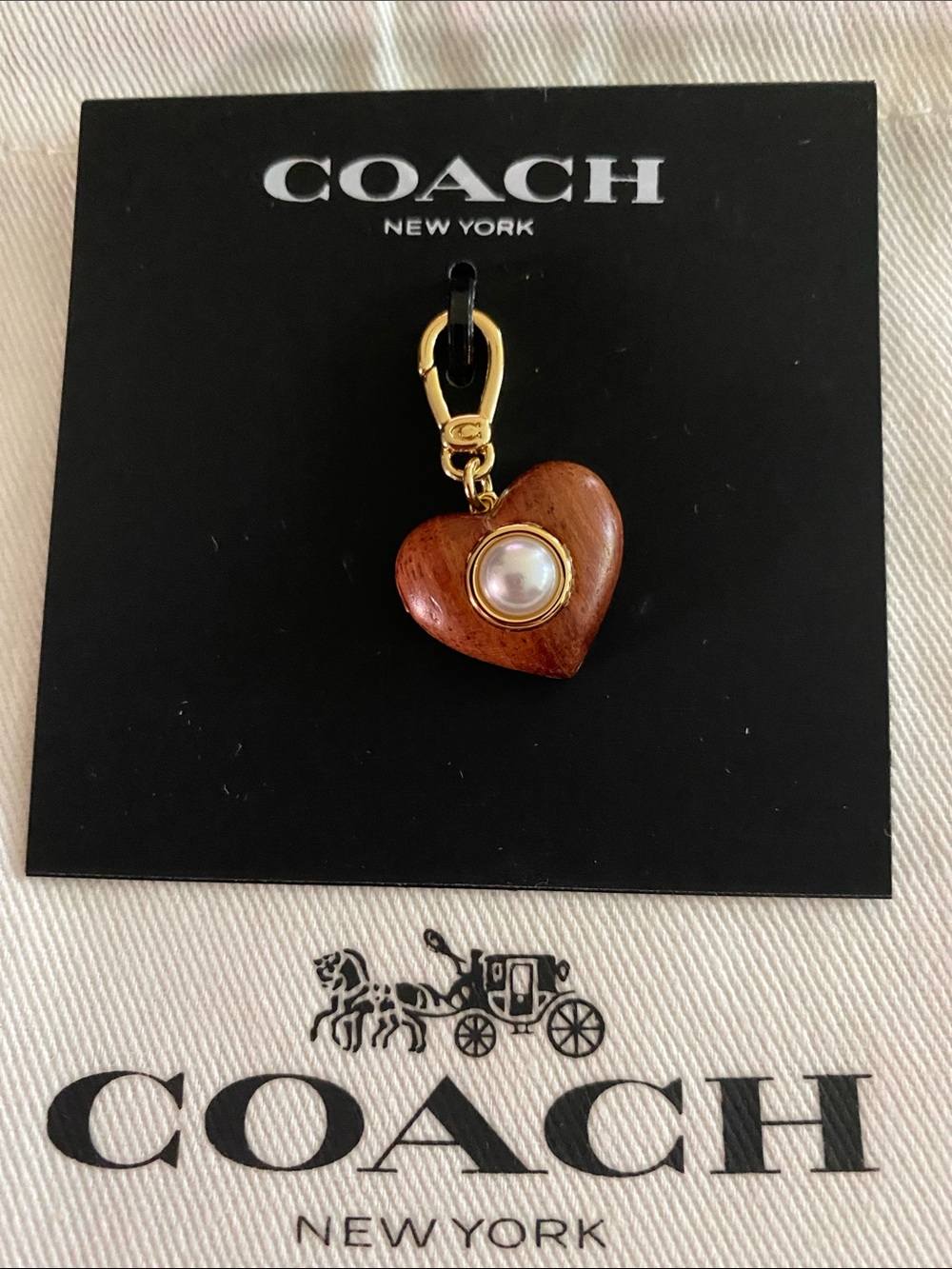 NWOT Coach Brown Heart pendant braclet charm with Gold Hardware and Pearl
